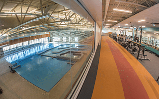 Why do people walk in the fitness center wet area?